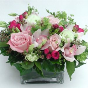 Pale pink and white roses with small hints of  bright pink