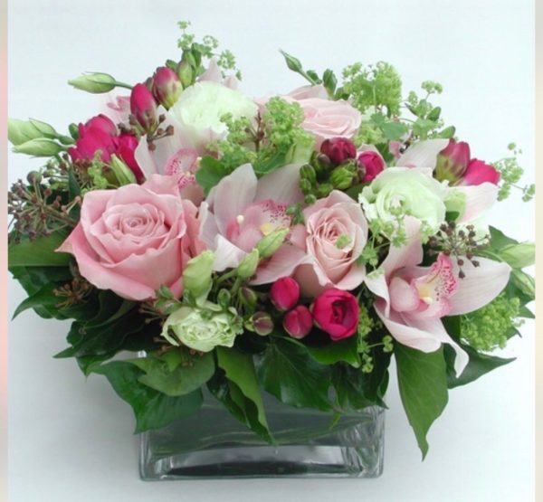 Pale pink and white roses with small hints of  bright pink